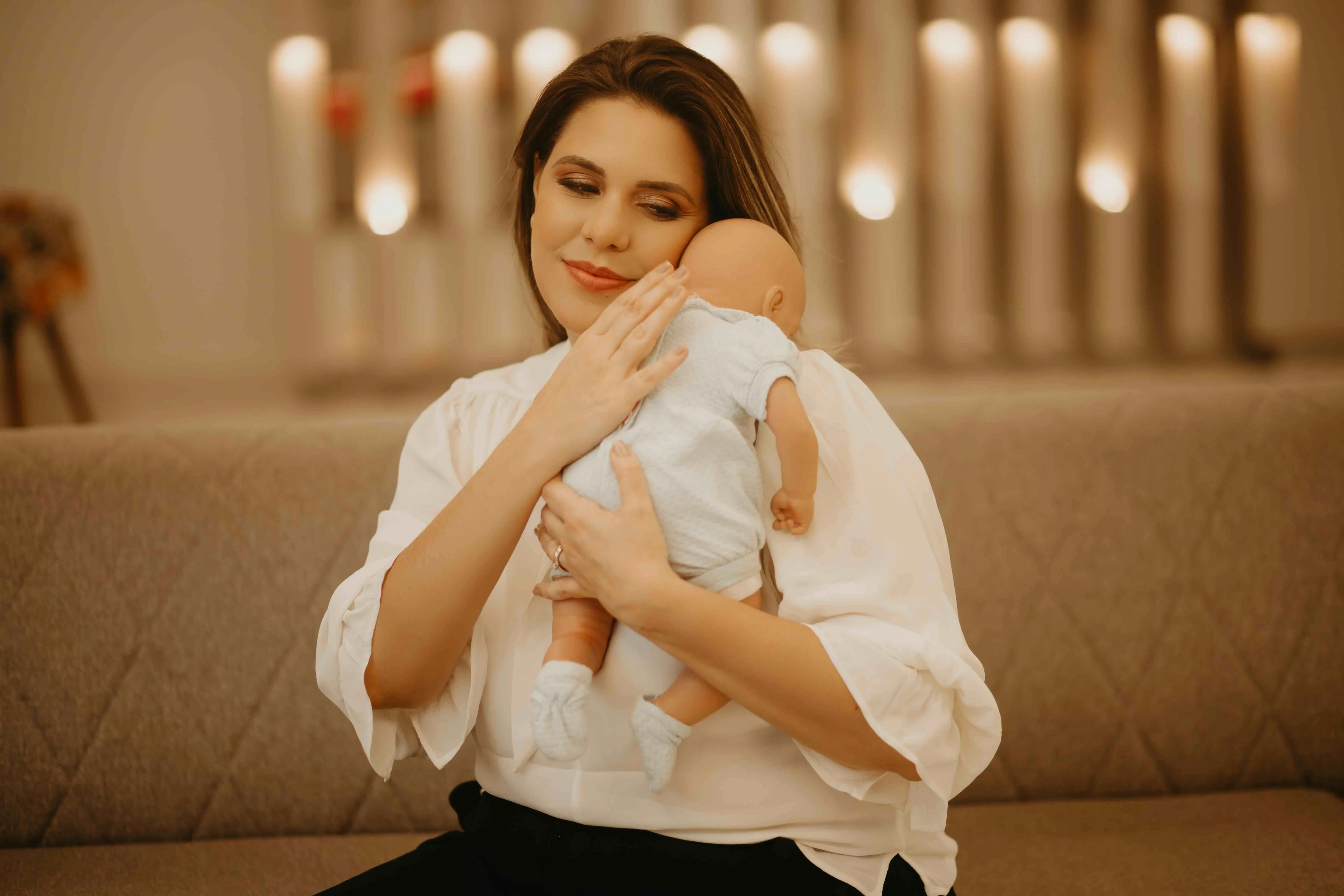Dra. Juliana com um bebê no colo